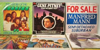 A collection of vinyl long play vinyl record album