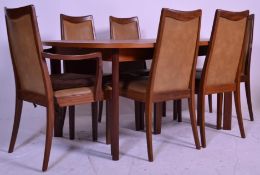A vintage retro G Plan 1970's dining suite to include a teak extending dining table, the table top