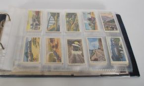A collection of vintage 20th Century W.A. & A.C. Churchman cigarette trade cards in full sets stored