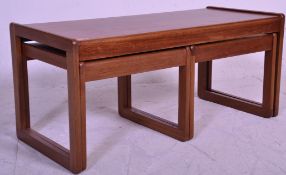 A retro mid 20th Century teak wood nest of tables