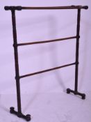 A Victorian 19th century mahogany candy / spiral twist carved towel rail stand. Turned columns