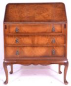 A mid century burr walnut Queen Anne revival ladies bonheur de jour / writing bureau desk being