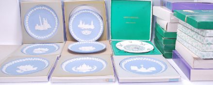 A collection of 20th Century christmas plates of varying sizes and designs. The plates consisting of