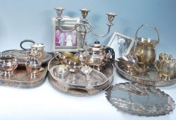 A selection of vintage silver plated items dating from the early 20th Century to include a three