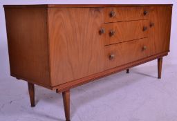 A retro 20th Century teak wood sideboard credenza having a bank of three drawers flanked by a single
