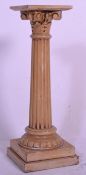 A good early 20th Century carved pine Corinthian column Jardiniere stand finished in white raised on