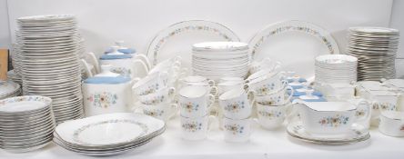 An extensive Royal Doulton ' Pastorale ' dinner service comprising cups, saucers, plates, meat
