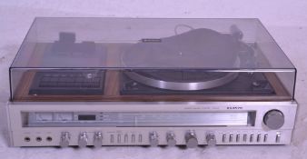A retro 20th Century Sanyo Stereo Music System Model G 3003, having tape player / recorder, record
