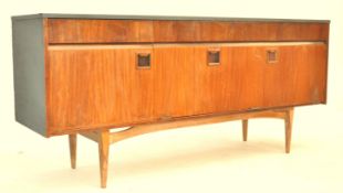 A 1960's EON Elliots Of Newbury  retro vintage teak wood sideboard credenza having three drawers