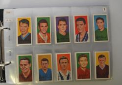 An album of vintage cigarette and confectionery trade cards in full sets. Complete sets include