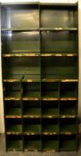 A vintage mid 20th Century Industrial sectional metal factory pigeon holes/cubby cabinet unit having