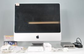 A 2009 model Apple iMac desktop computer in good condition having a 20 inch screen display with a