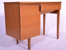 A retro mid 20th Century teak desk / sewing table