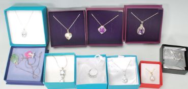 A collection of ladies silver jewellery to include a pendant necklace set with a purple stone
