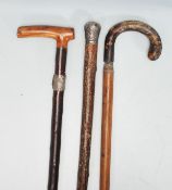 A group of three vintage 20th Century walking stick canes dating from the early 20th Century to