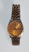 A good gentleman's Seiko 5 Automatic water resistant wrist watch having a gold face with gilt