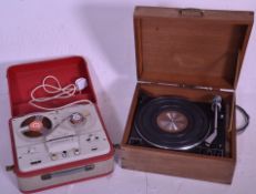 A vintage retro Garrard record Player Turntable Transcription Model AP 76 within an oak case.