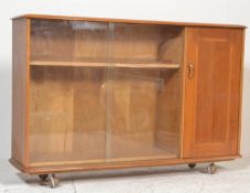 A mid century oak display cabinet bookcase room di