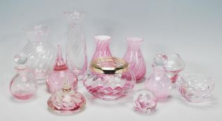A good collection of 20th Century Caithness glassware, mostly pink in colour to include a matching