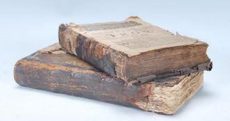 An interesting pair of 17th Century antique leather bound book. One entitled 'The Destruction Of
