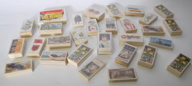 A collection of vintage cigarette and tea trade cards in mostly complete bundles. Sets include Wills