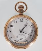 A hallmarked 9ct yellow gold open face pocket watch having a white enamel face with Arabic numeral