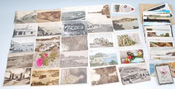 A selection of late 19th and early 20th Century postcards to include a photographic local interest