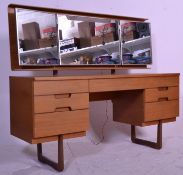 A vintage retro Uniflex mid 20th Century dressing table in the manner of Gunther Hoffstead  having a