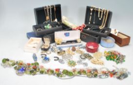 A collection of vintage costume jewellery to include a good selection of necklaces including