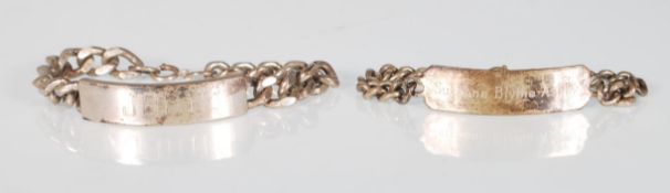Two vintage silver hallmarked identity bracelets both having curb link chains with central