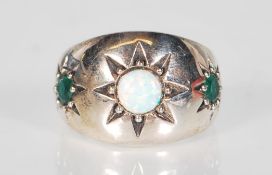 A stamped 925 silver gypsy style ring. The ring is set with the central stone of an opal.