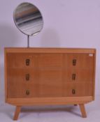 A vintage retro 20th Century light oak dressing table / chest of drawers having a single stem