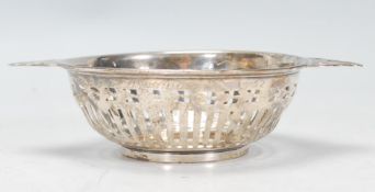 A mid 20th Century silver hallmarked trinket / bonbon dish of round form having pierced decoration