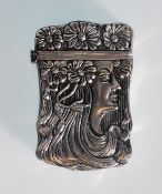 A silver plated vesta case featuring a hinge to the to and a match strike to the bottom. The case