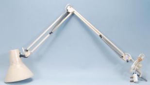 A vintage retro 1970's anglepoise desk lamp having a conical shade on a metamorphic posable arm with