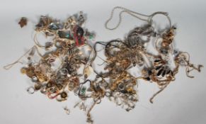 A good collection of vintage and latter costume jewellery to include multiple gold and silver tone