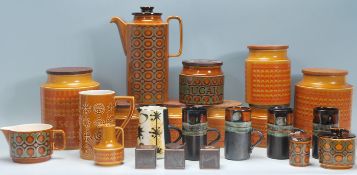 A selection of vintage retro Hornsea pottery to include Saffron pattern storage jars with wooden