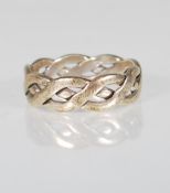 A stamped 375 9ct white gold ring having a pierced twist design. Weight 6.1. Size U.