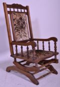 A 19th Century Victorian mahogany aesthetic movement Boston Rocker - American Rocking chair.