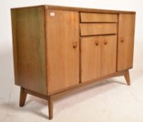 A vintage mid 20th Century 1960's 1970's beech wood sideboard having two angular beehive drawers