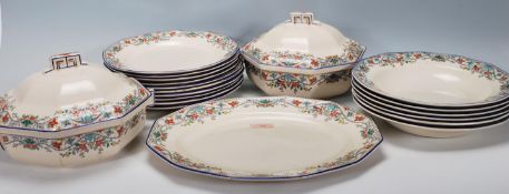 A Royal Doulton Draycott pattern Art Deco dinner service comprising dinner plates, side plates, meat