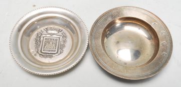 A 20th Century silver English hallmarked pin / trinket dish of round form. Hallmarked for London