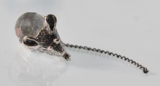 A stamped 925 silver brooch of small proportions in the form of a mouse being set with a faceted