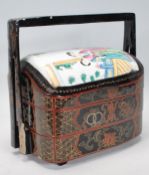 A Chinese lacquered two layer marriage box of rect