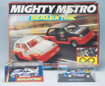 A boxed set of Mighty Metro Scalextric Superscale along with a boxed C2045 Scalextric Porsche