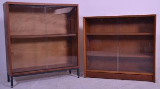 A retro 20th Century 1960's Herbert Gibbs teak wood sliding glass library bookcase cabinet having