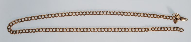 A 9ct gold double curb link chain necklace having a lobster clasp. Marked 375 to the clasp. Weight