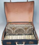 A vintage mid Century Settimio Soprani piano accordion having celluloid keys with a geometric inlaid