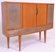 A vintage 1960's / 70's stereogram being beech wood cased, having a central Decca radio with
