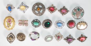 A selection of 20 assorted fashion jewellery brooches to include a celtic knot brooch set with an